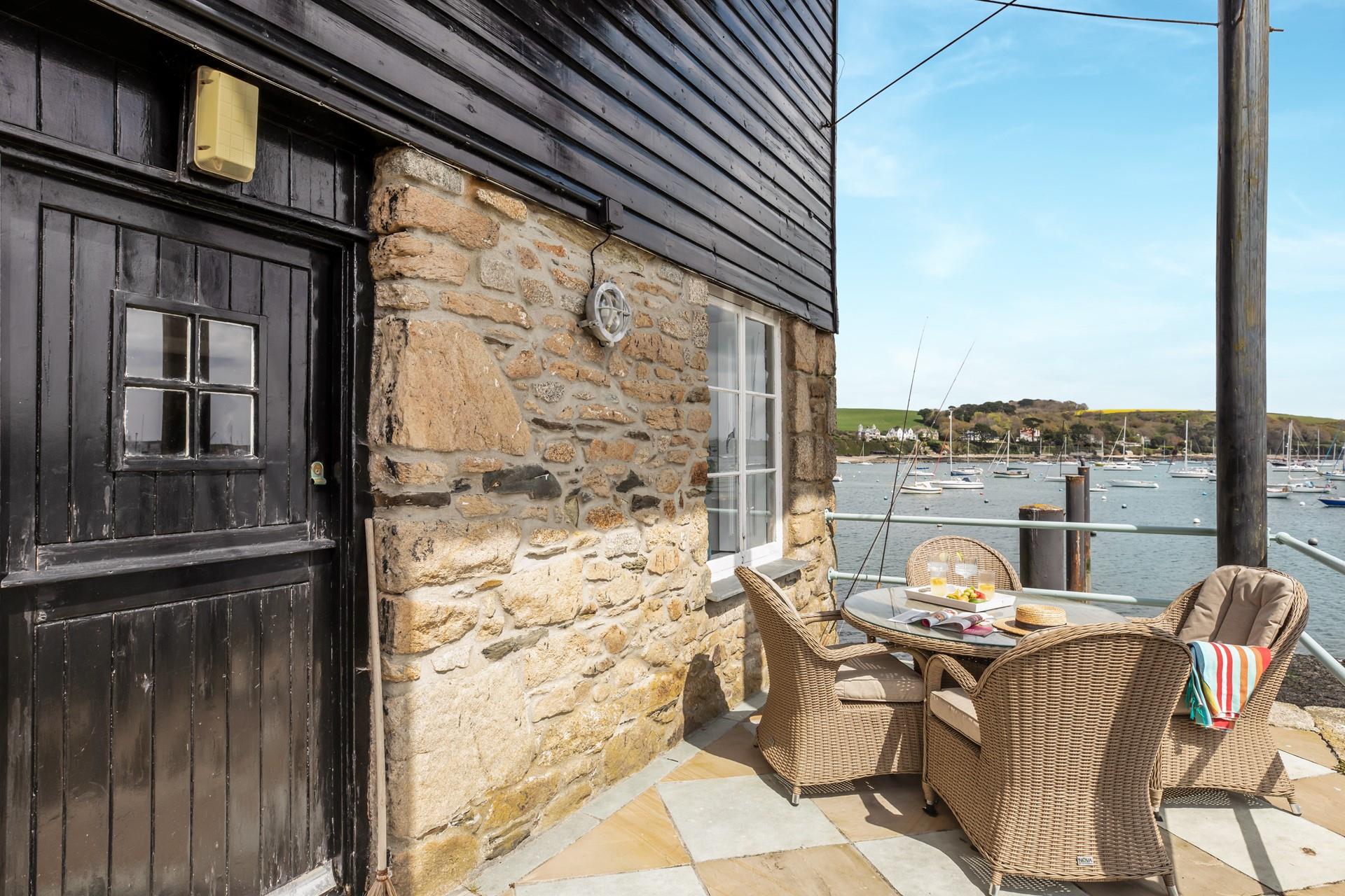 Tuck into drinks and nibbles on the patio.