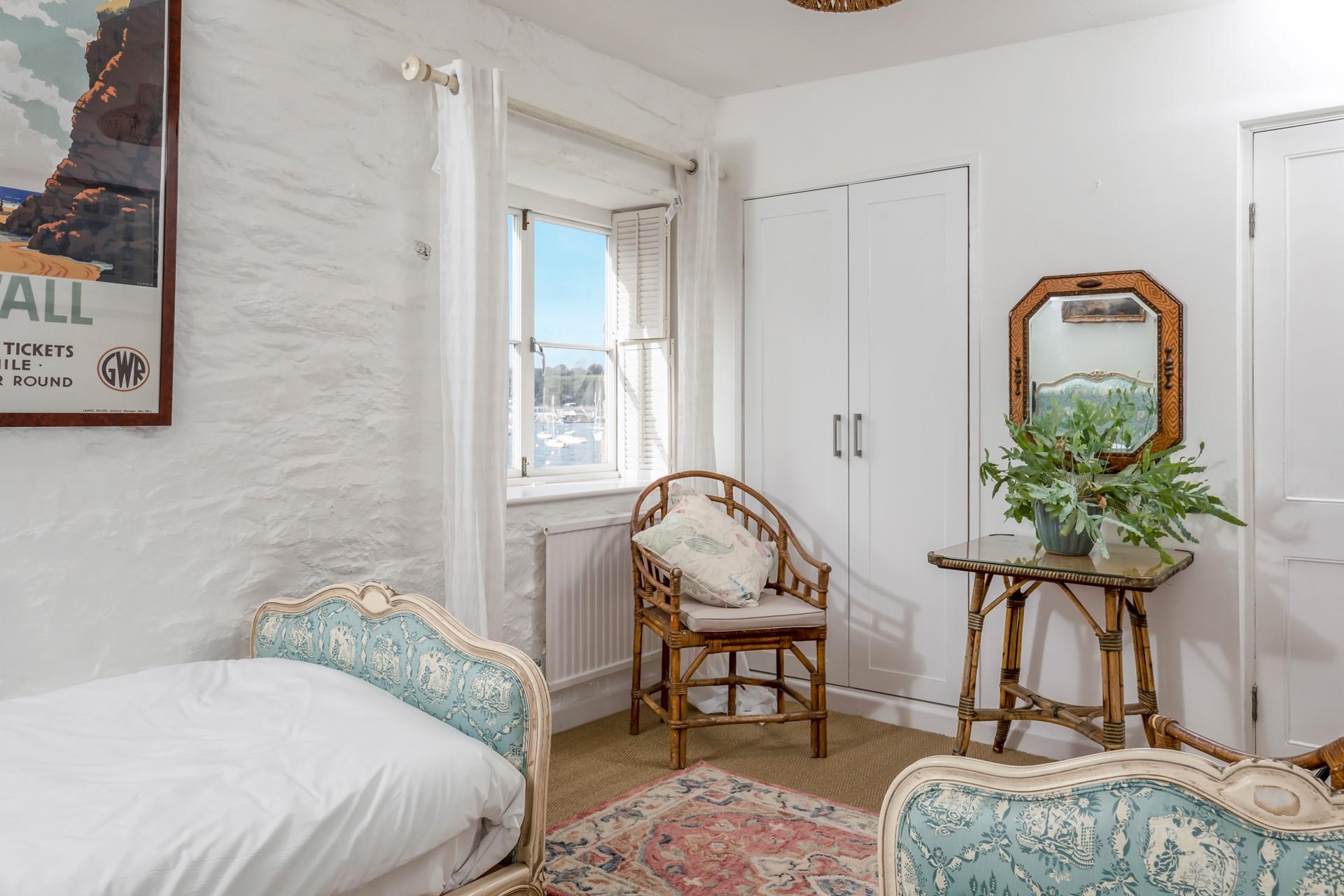 Open the shutters each morning to stunning waterside views.