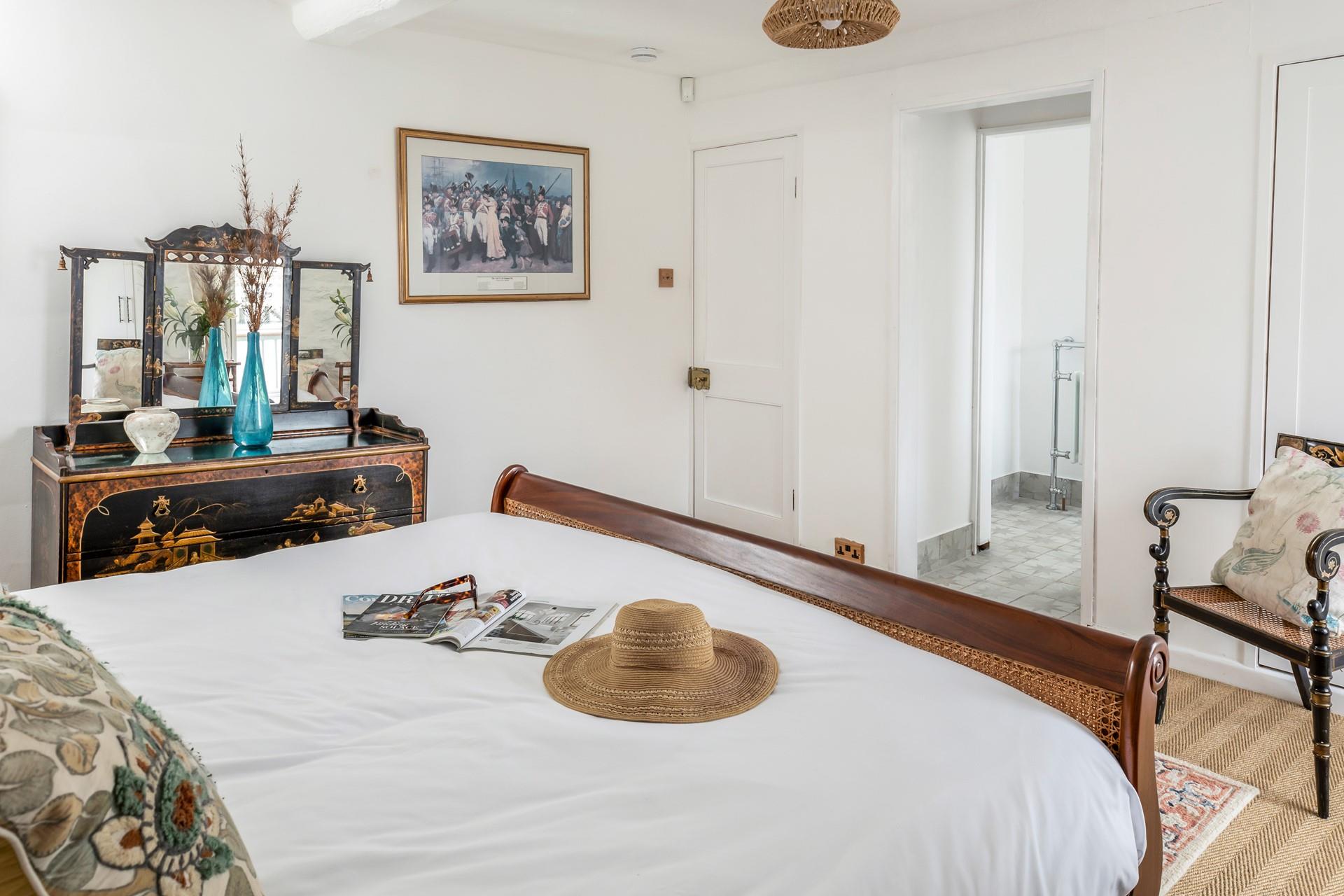 Climb out of bed and head into the en suite to get ready for the day.