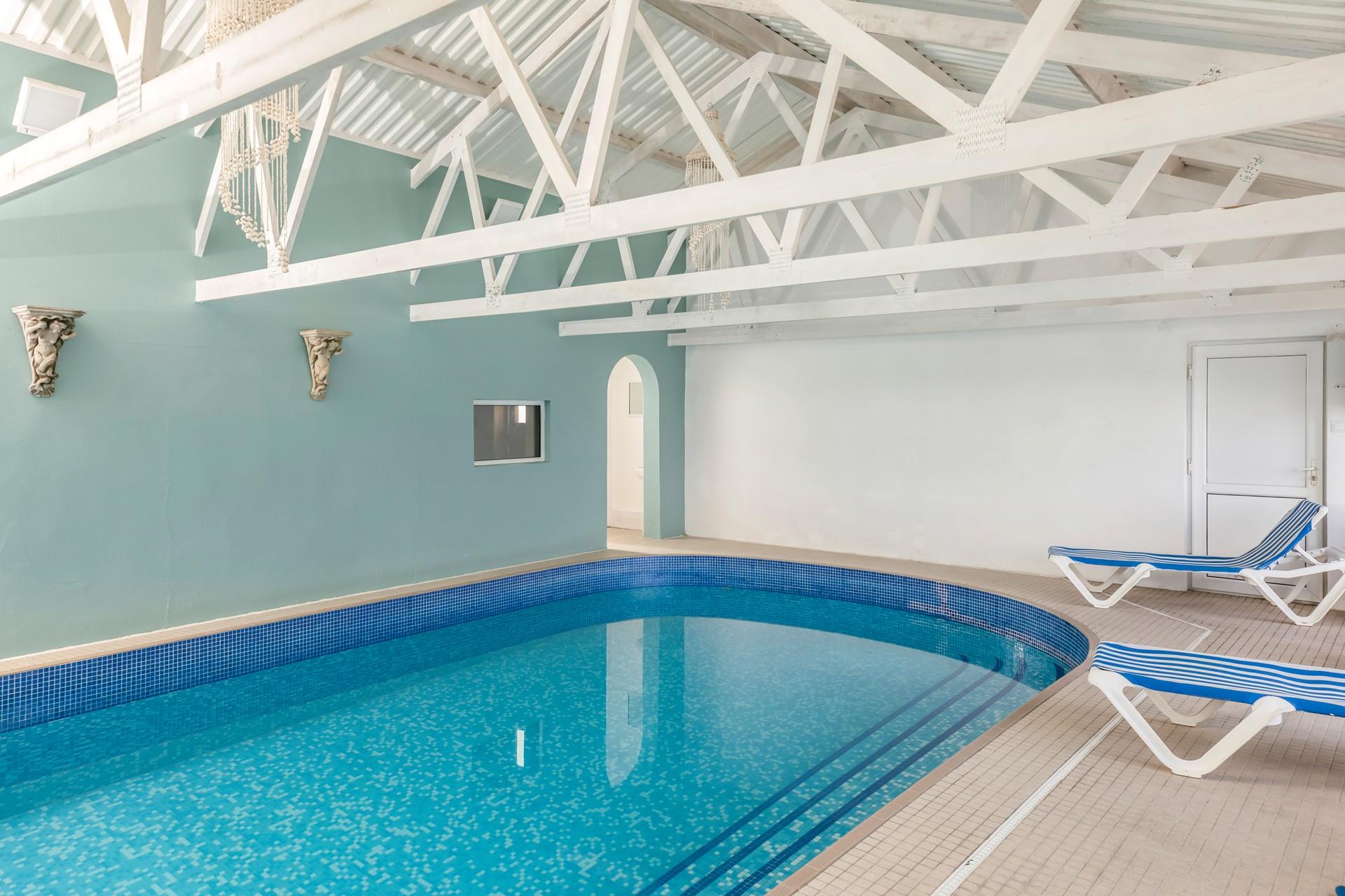 The indoor heated pool is ideal for rainy days.