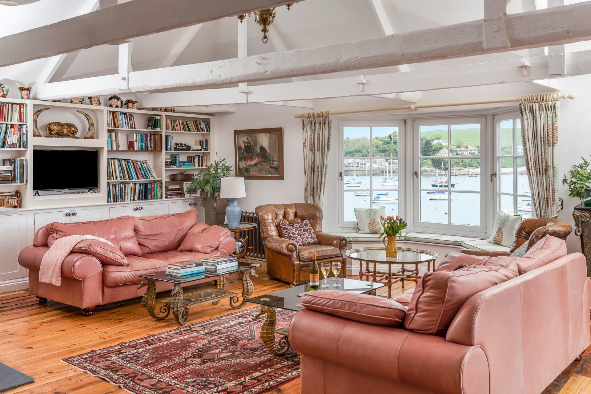 The window seat is the perfect spot to get stuck into a good book.