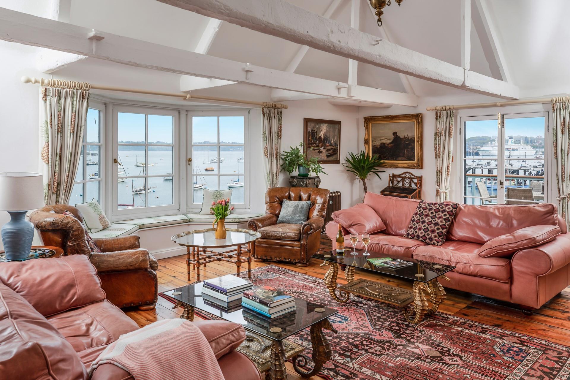 The large sitting room is perfect for entertaining or just watching the view!
