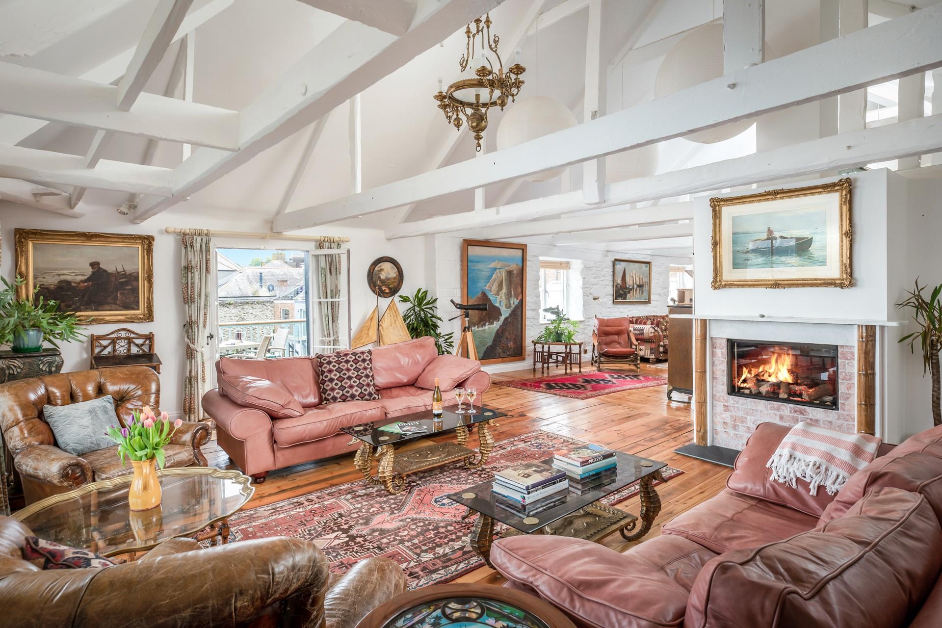 Nautical and seaside touches await in the large sitting room.