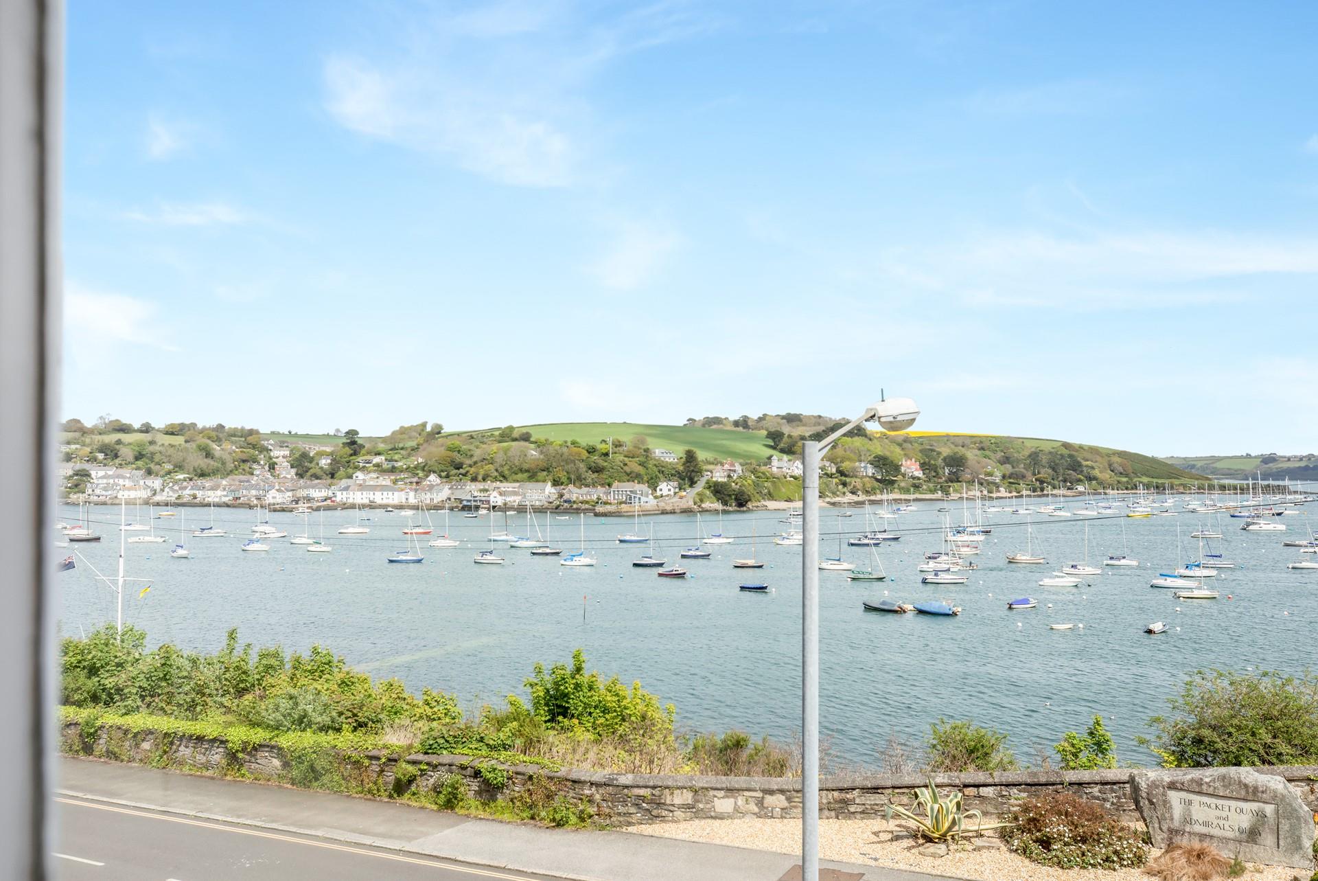 Watch the boats bobbing on the water in this beautiful setting.