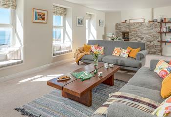 The spacious sitting room is the perfect place to spend quality time with family.