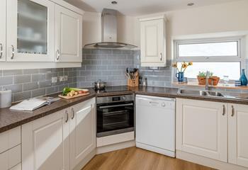 The kitchen is well-equipped to cook tasty meals.