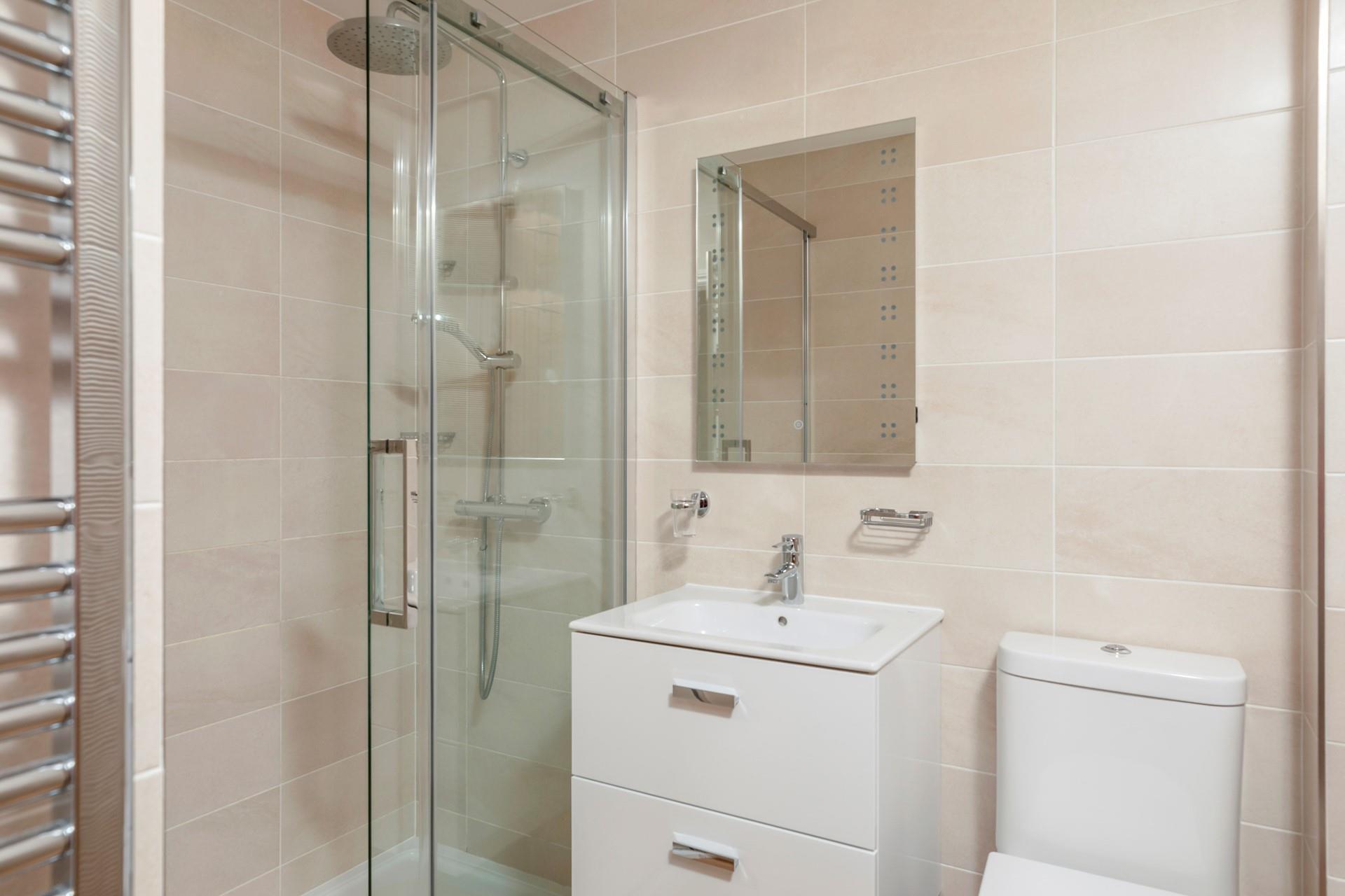 Wash off sandy toes after relaxing on the tropical sands at Carbis Bay beach.