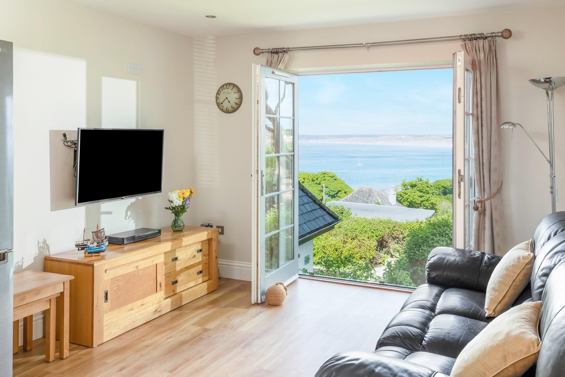 Open the doors and enjoy stunning views of St Ives Bay!