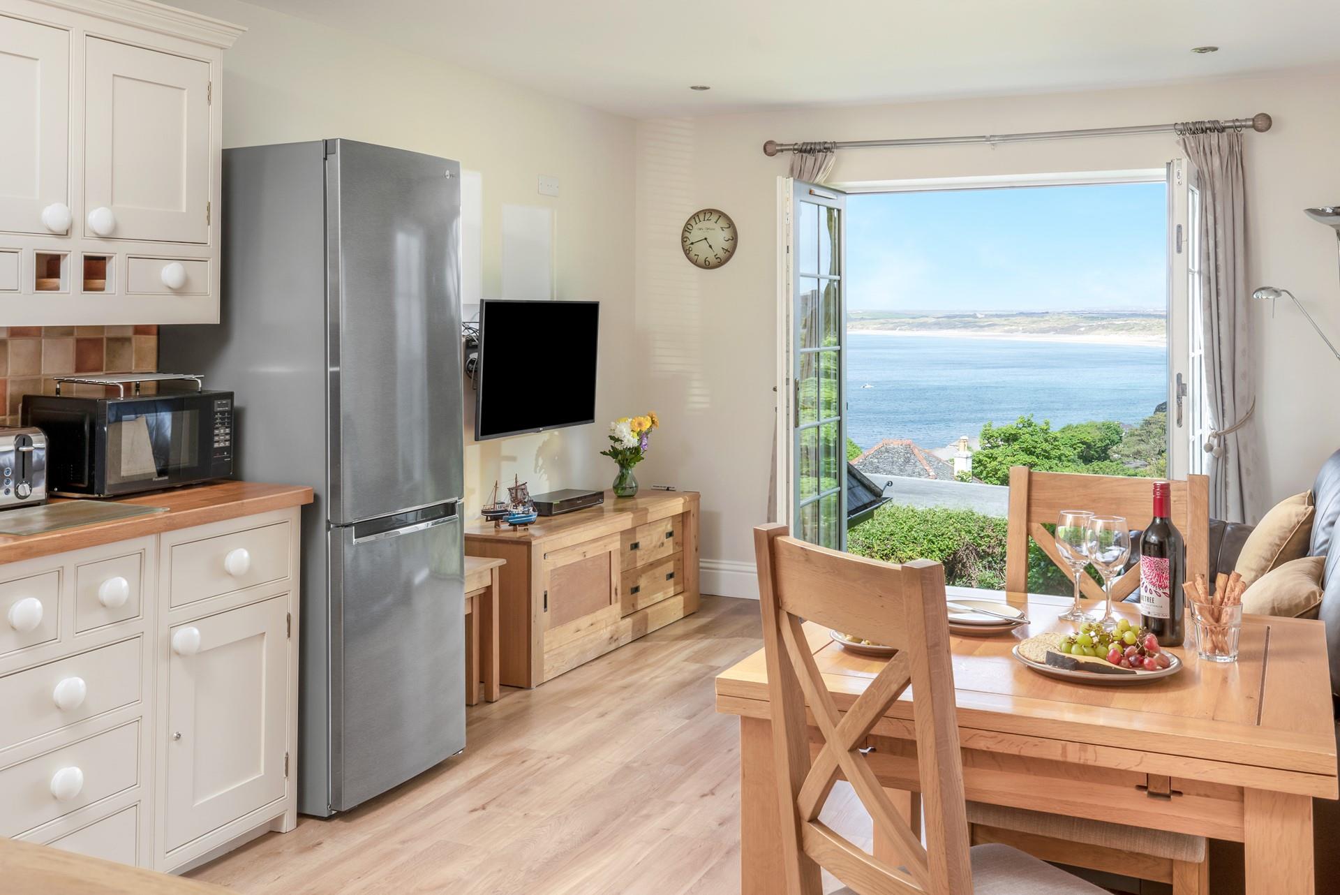 Tuck into a hearty meal with a sea view.