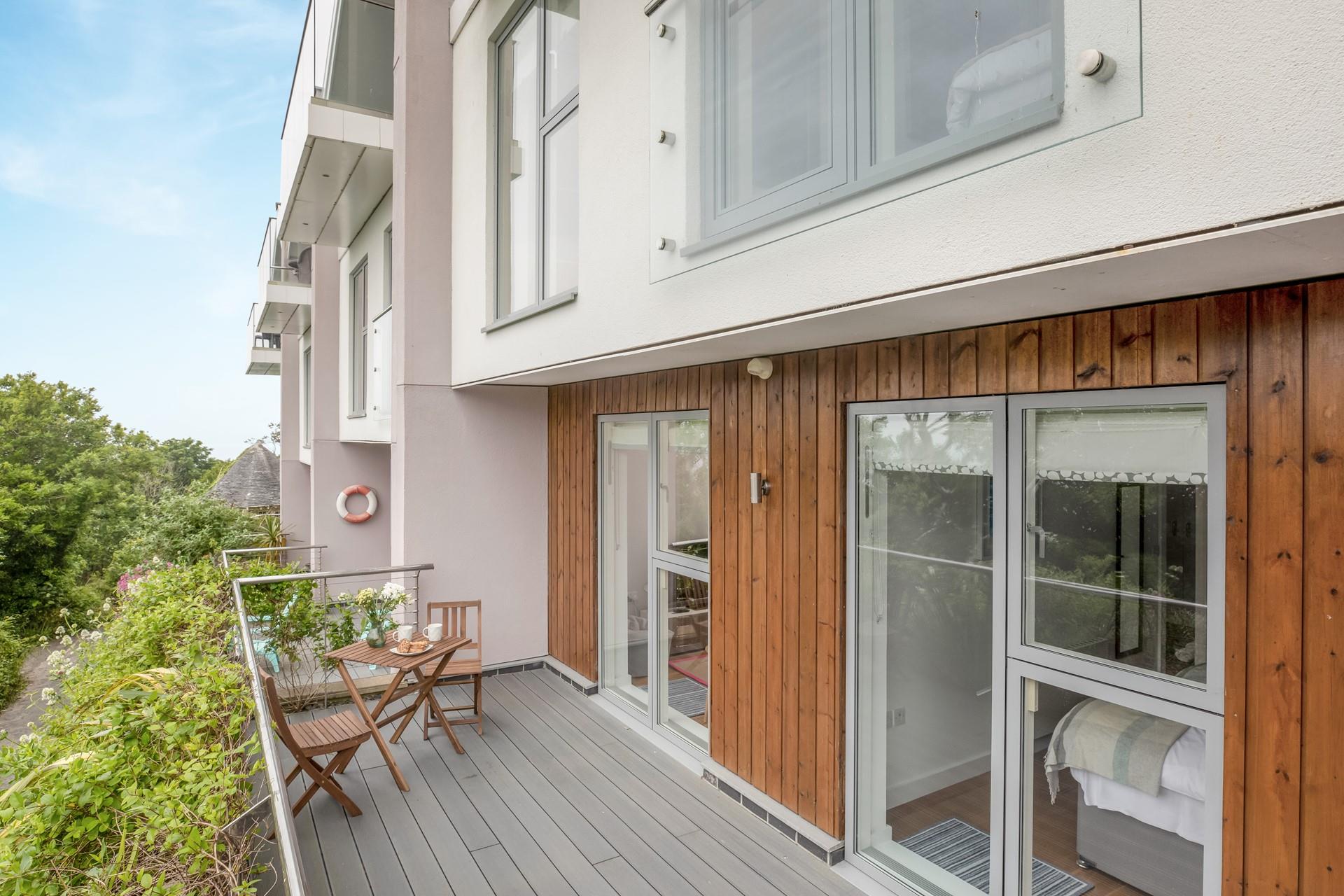 You can step from the snug and the twin bedroom straight onto the lower balcony.