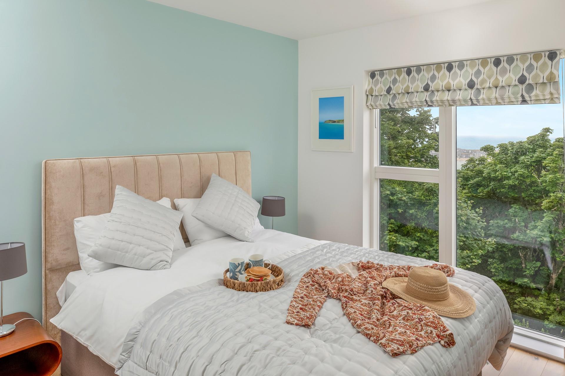 Awaken to glimpses of beautiful St Ives on the horizon.