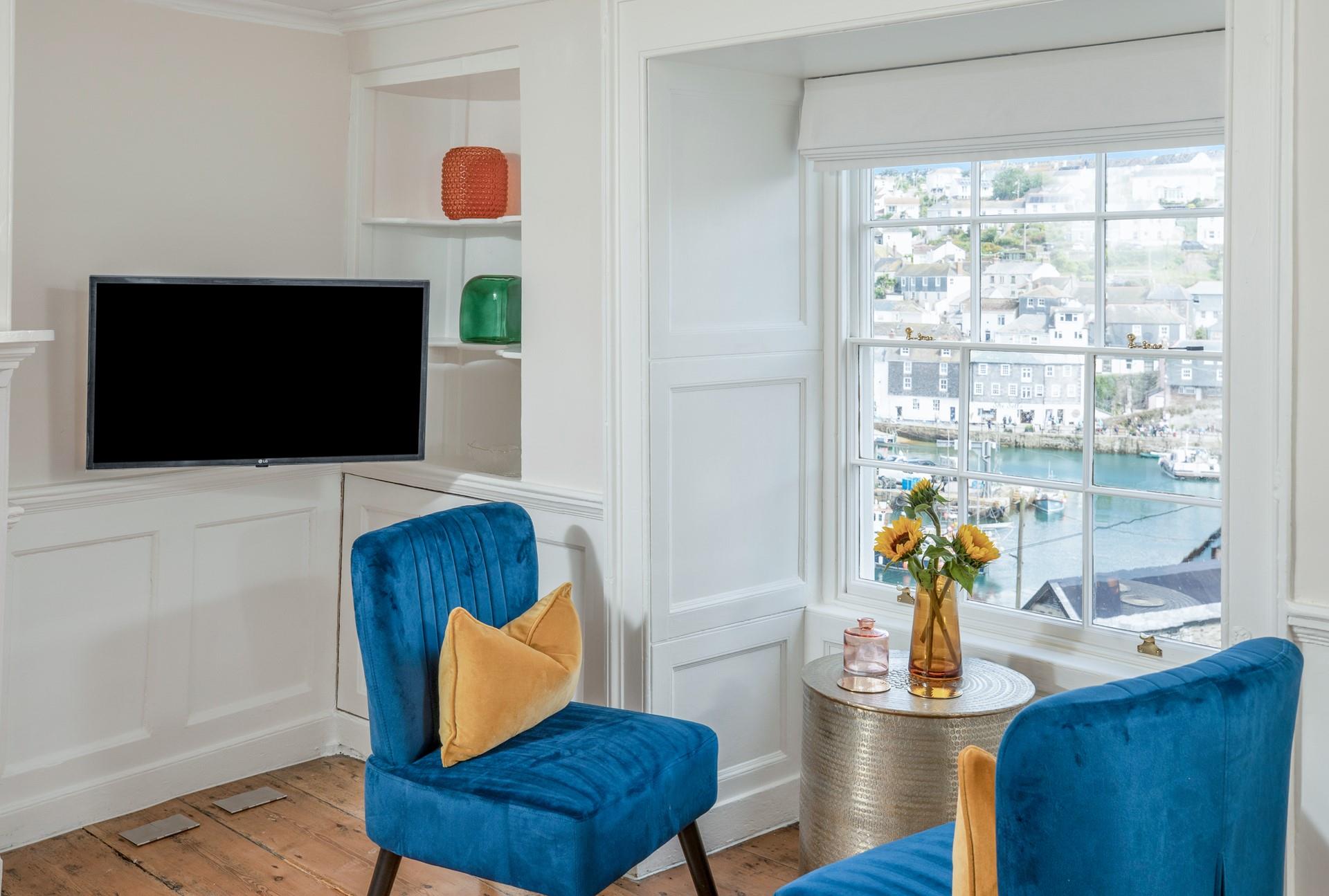 Sit in the window seat and enjoy a cuppa while watching the boats bob by.