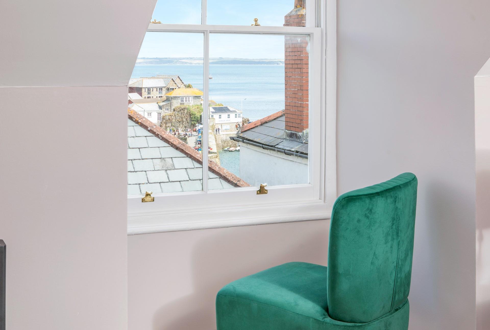 Watch the boats on the serene waters in the harbour.