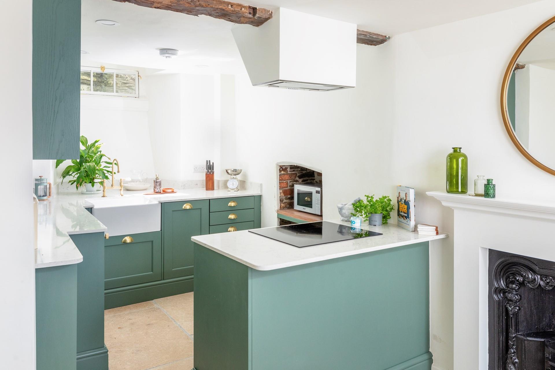 The kitchen is modern and stylish, perfect for cooking up a storm!