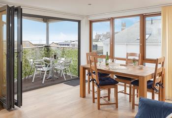 Open the patio doors to let the summer breeze through.