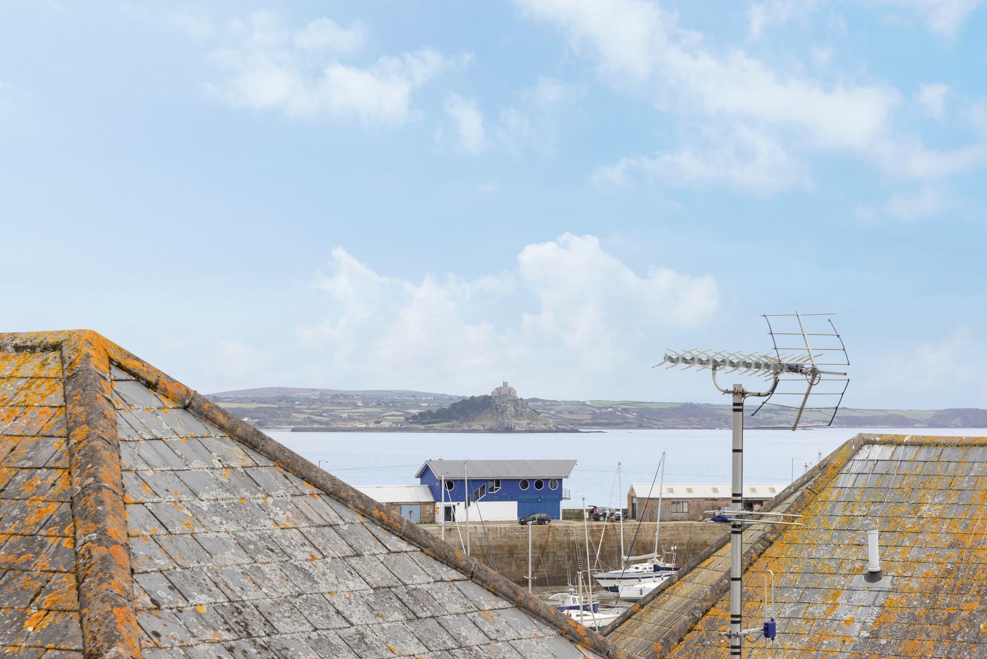 The apartment benefits from far-reaching sea views.