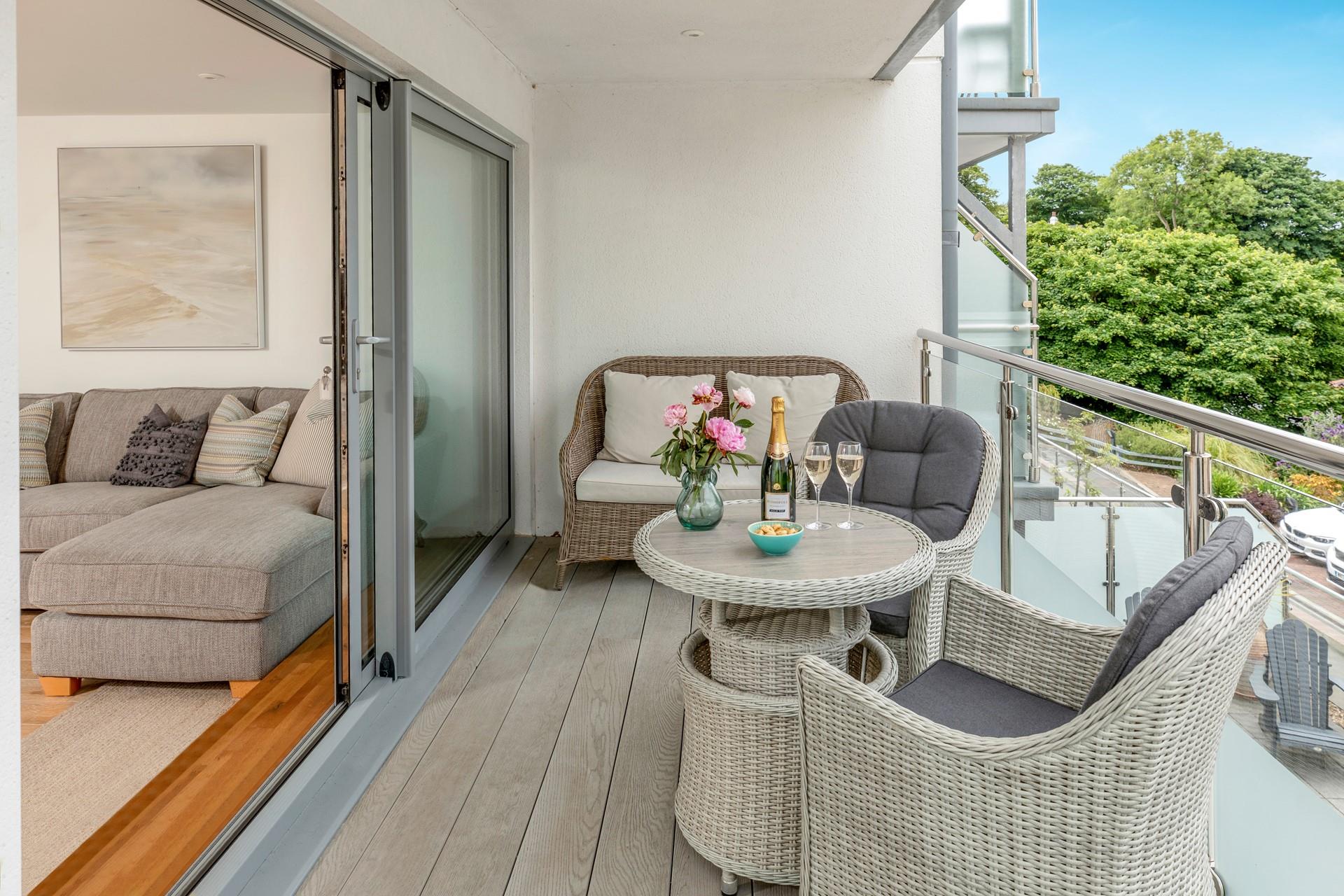 Pour yourself a glass of bubbles to enjoy on the balcony.