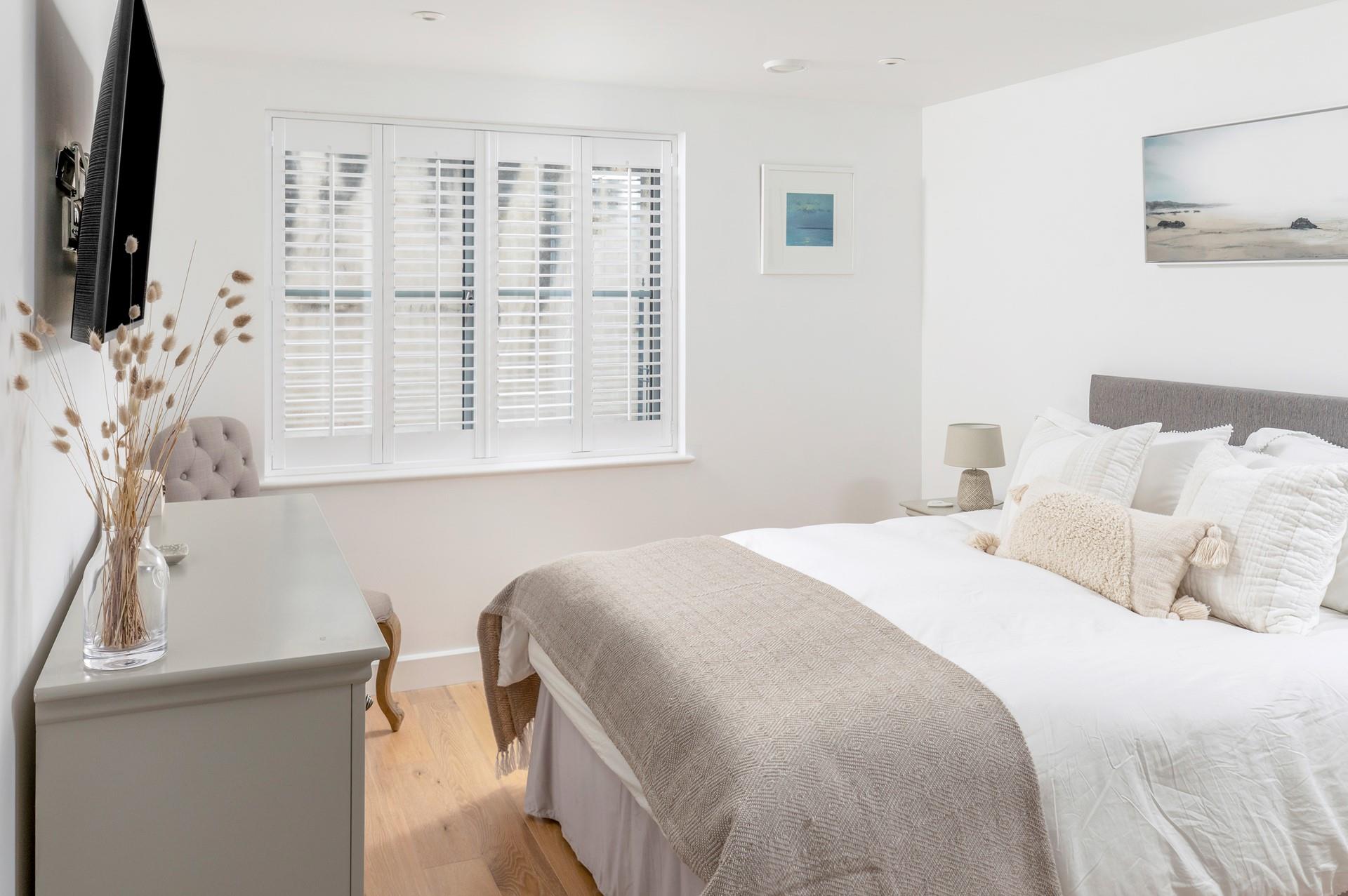 Wake up in the spacious bed refreshed and ready for the day.