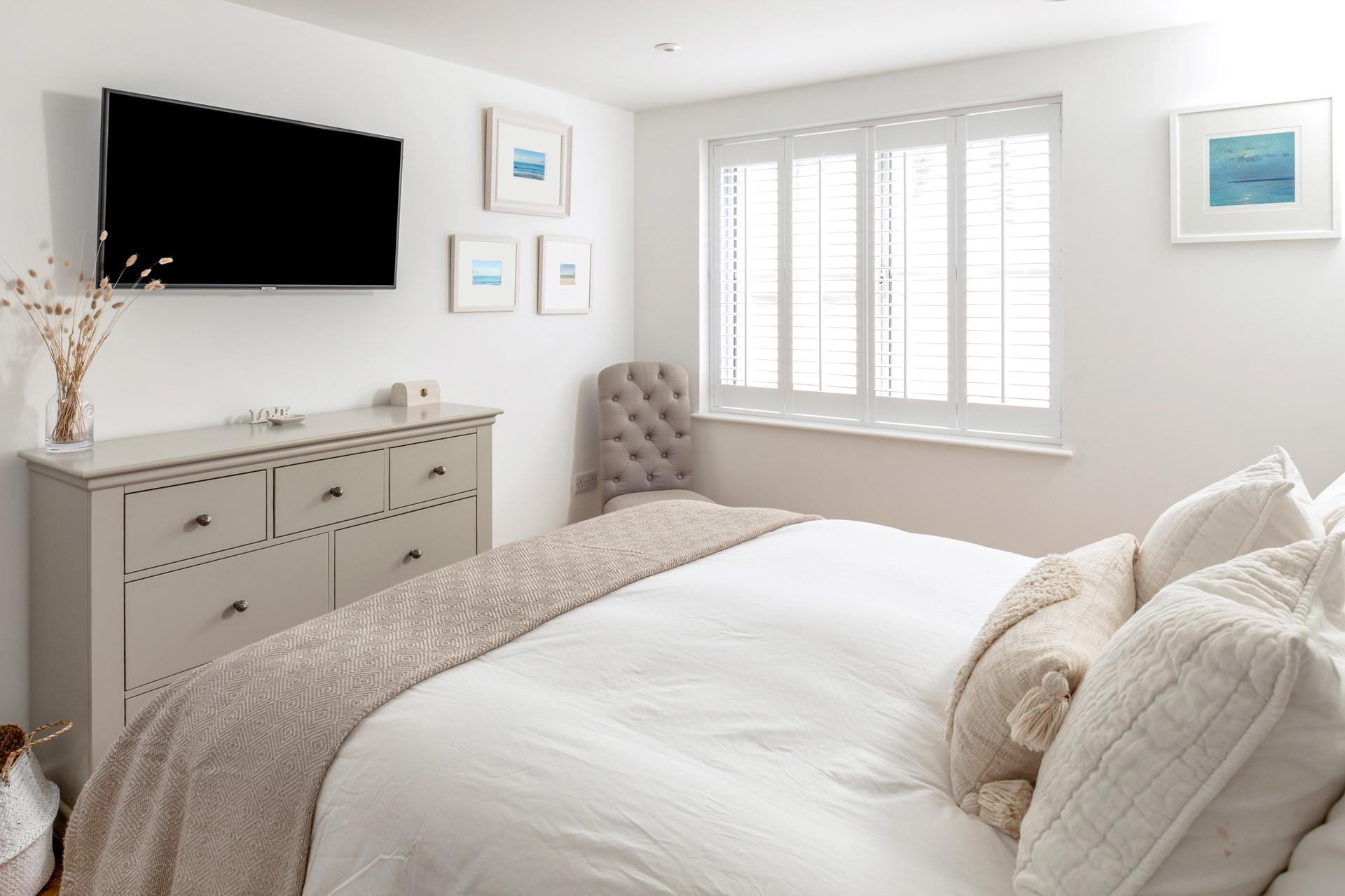 After a busy day on the beach, come back to tuck into the comfortable bed.