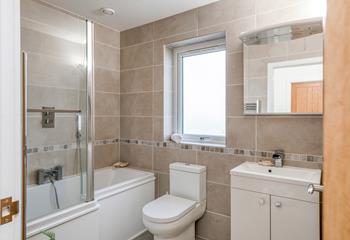 The bathroom gives you a choice between a relaxing bath or an invigorating morning shower.