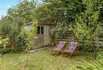 The back garden is ideal for watching the little ones play.