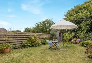 Dine al fresco in the spacious garden.