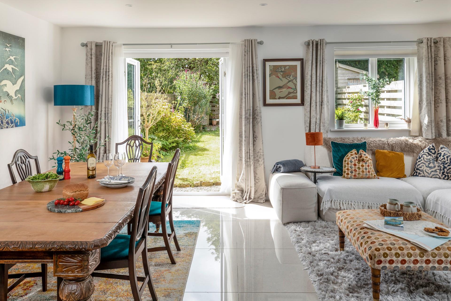 Open the patio doors and let the warm summer breeze into the stylish open plan living area.