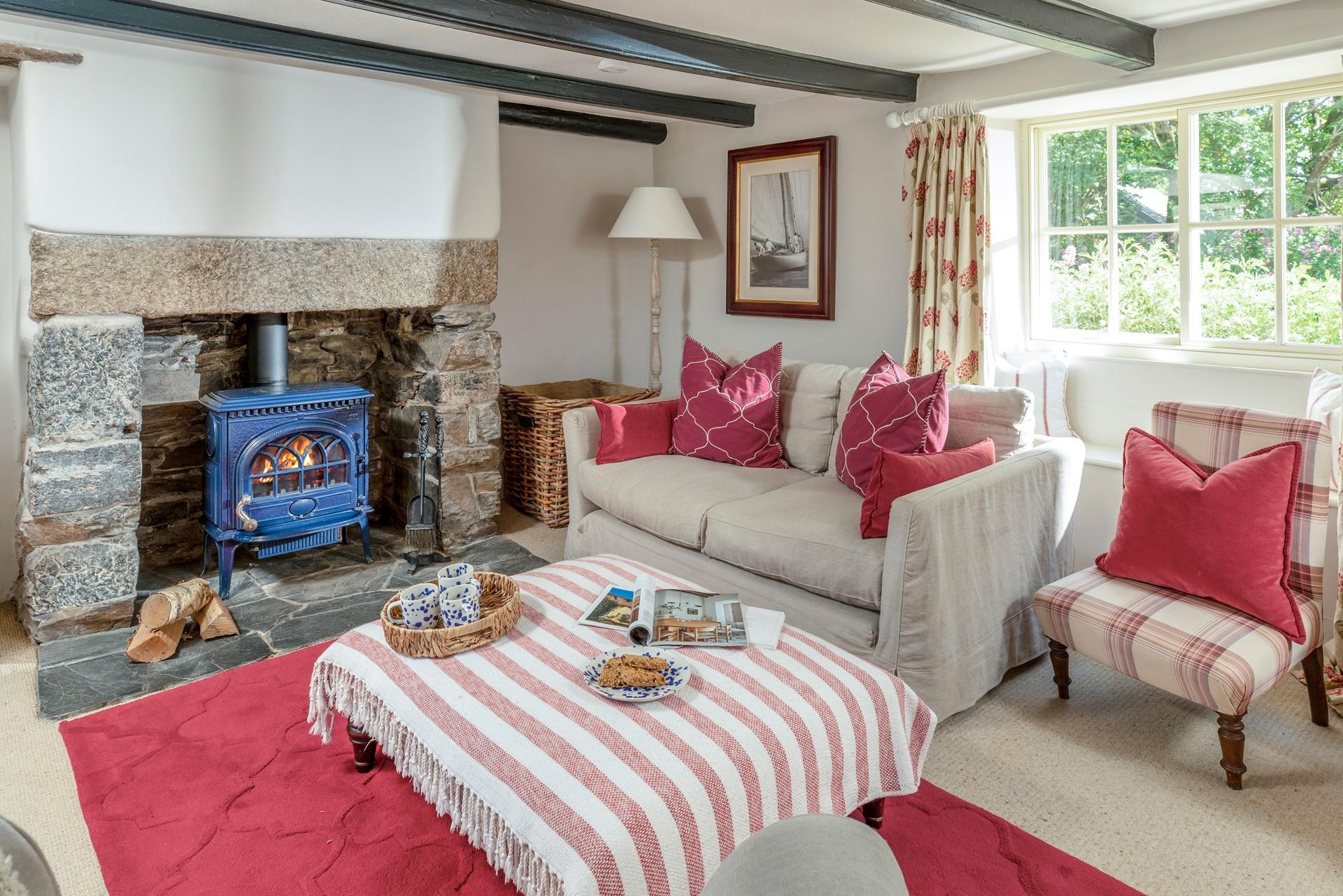 The cosy sitting room is ideal for winter nights in front of the fire.