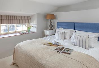 The bedrooms are decorated with seaside blues.