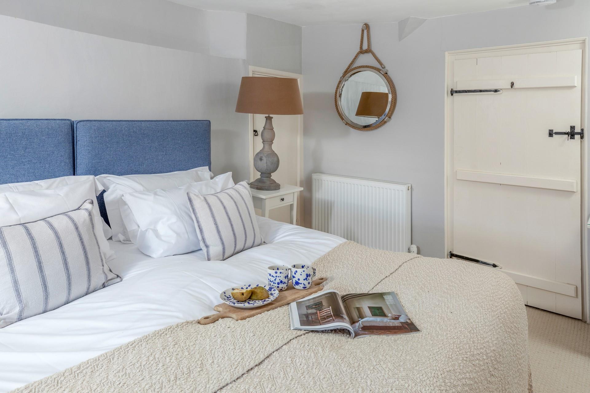 Sink into a restful night's slumber in the comfortable and spacious bed.