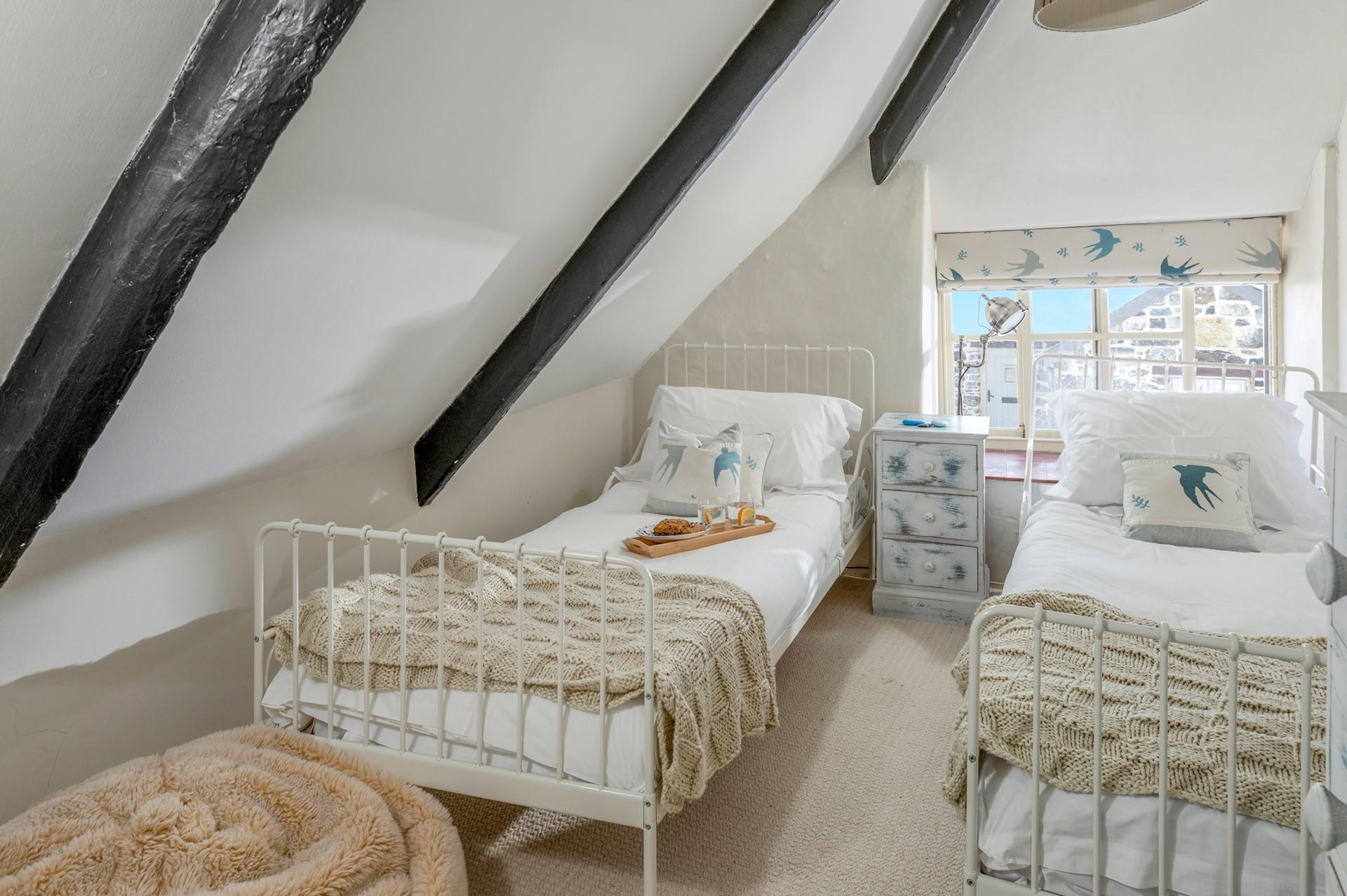 The twin beds are perfect for relaxing evenings after busy days.