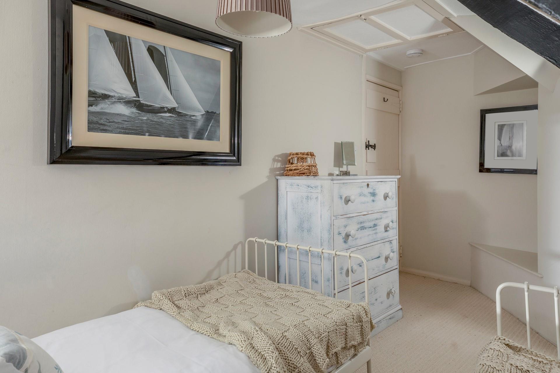 The twin beds allow for flexible sleeping arrangements.