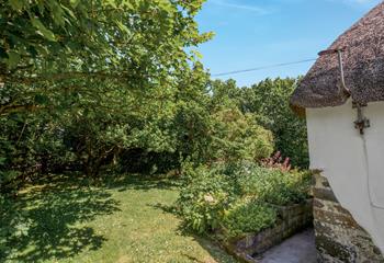 The garden is blooming in the summer months.