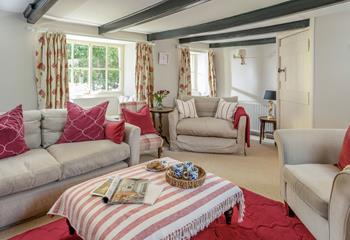 Sip a cuppa in the morning in the cosy cottage sitting room.