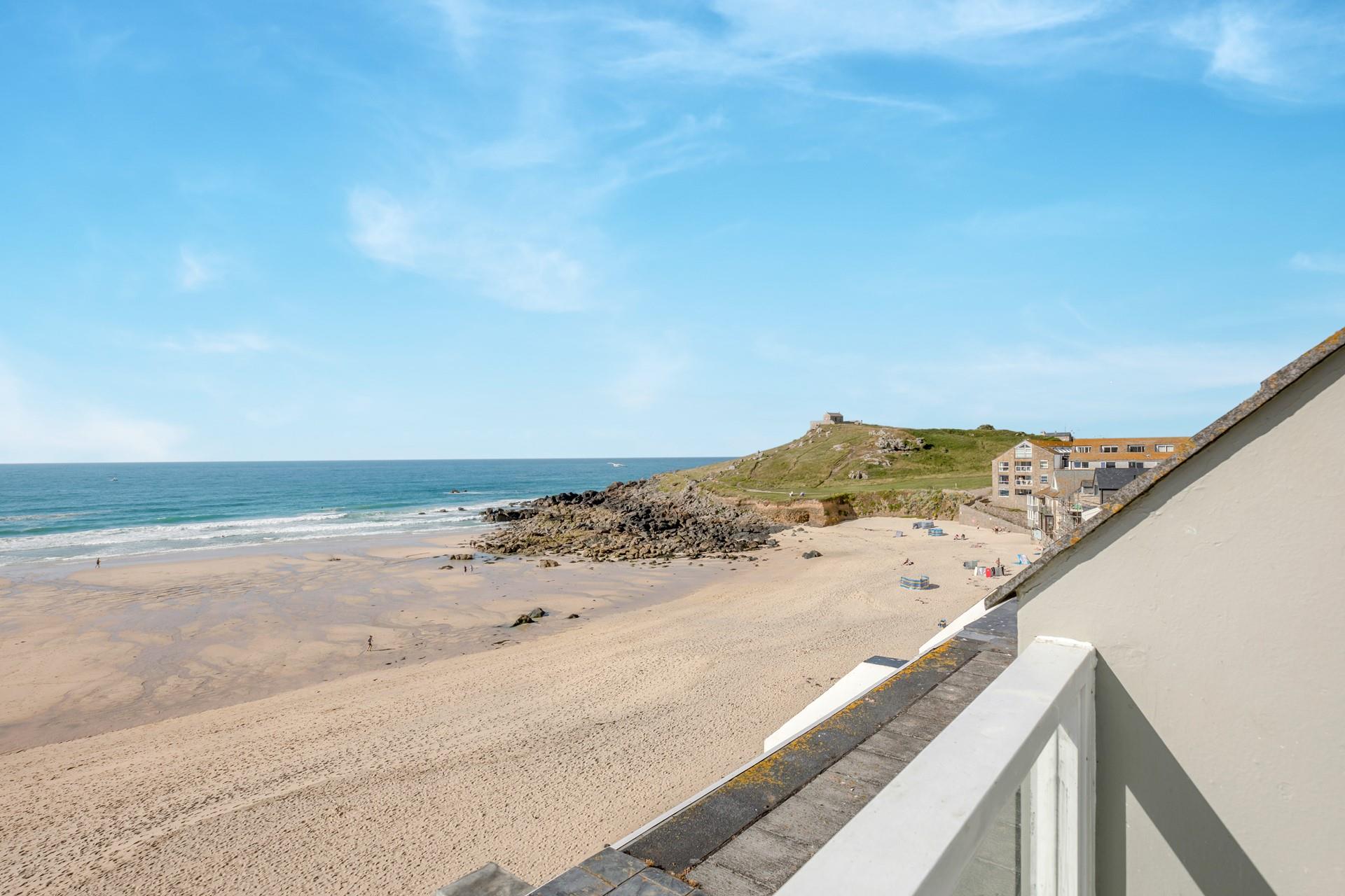 Take a morning dip in the sea on the peaceful beach.