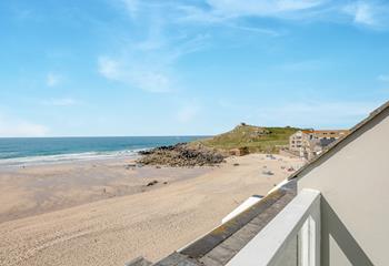 Take a morning dip in the sea on the peaceful beach.