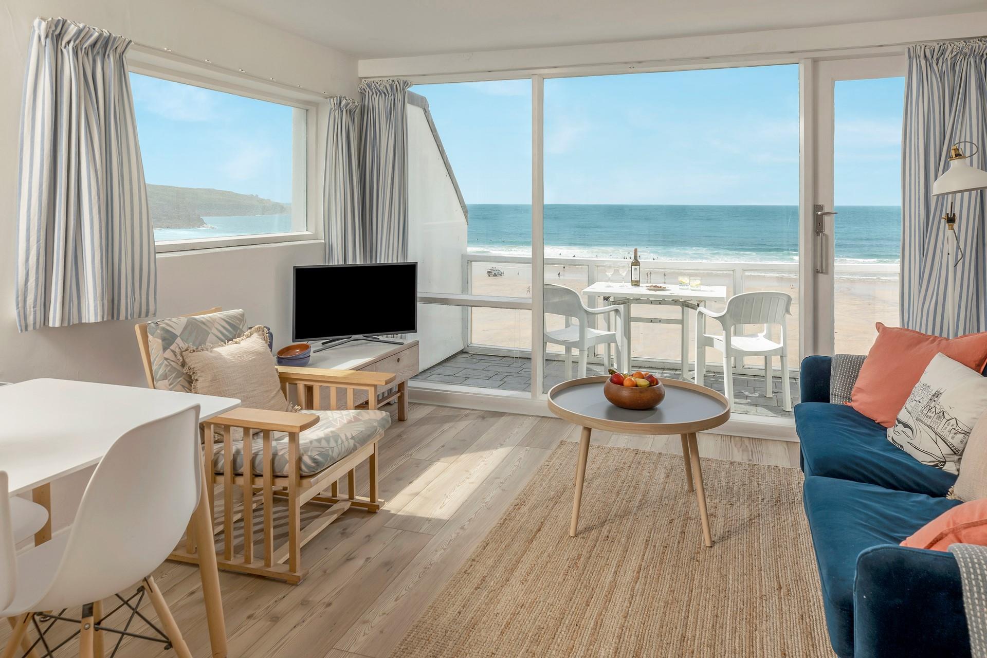 Sip a cold drink as the waves roll onto the shore.