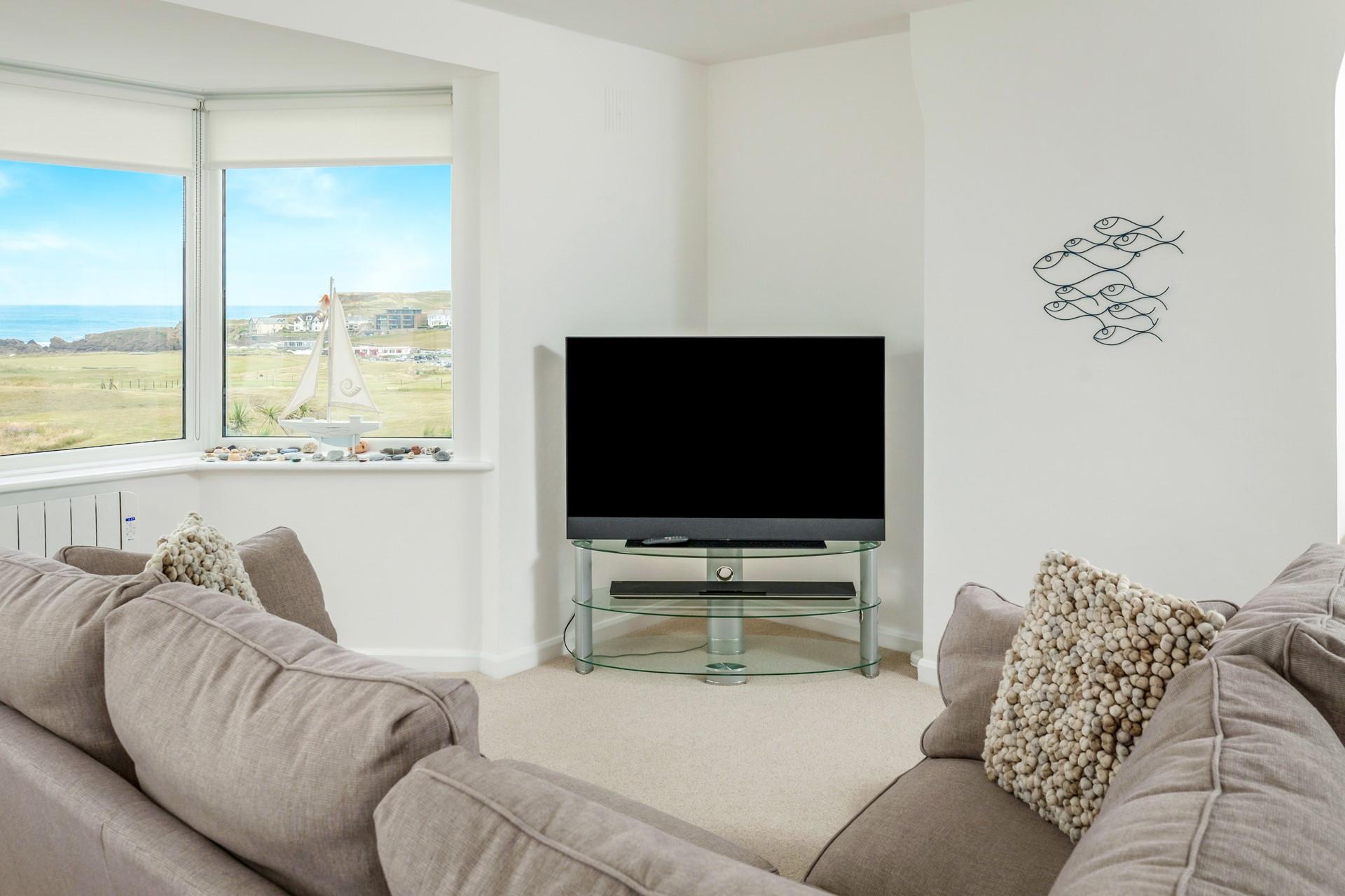 Snuggle up with a loved one in the sitting room.