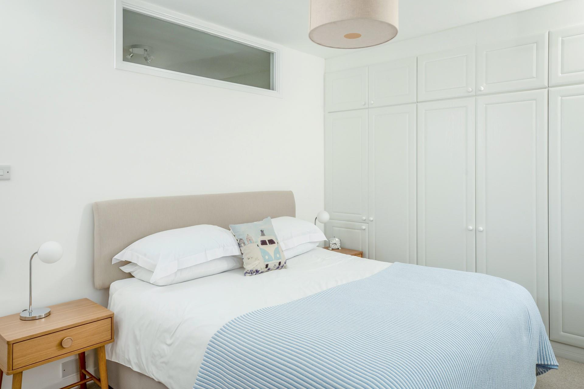 The built-in wardrobes allow plenty of storage space.