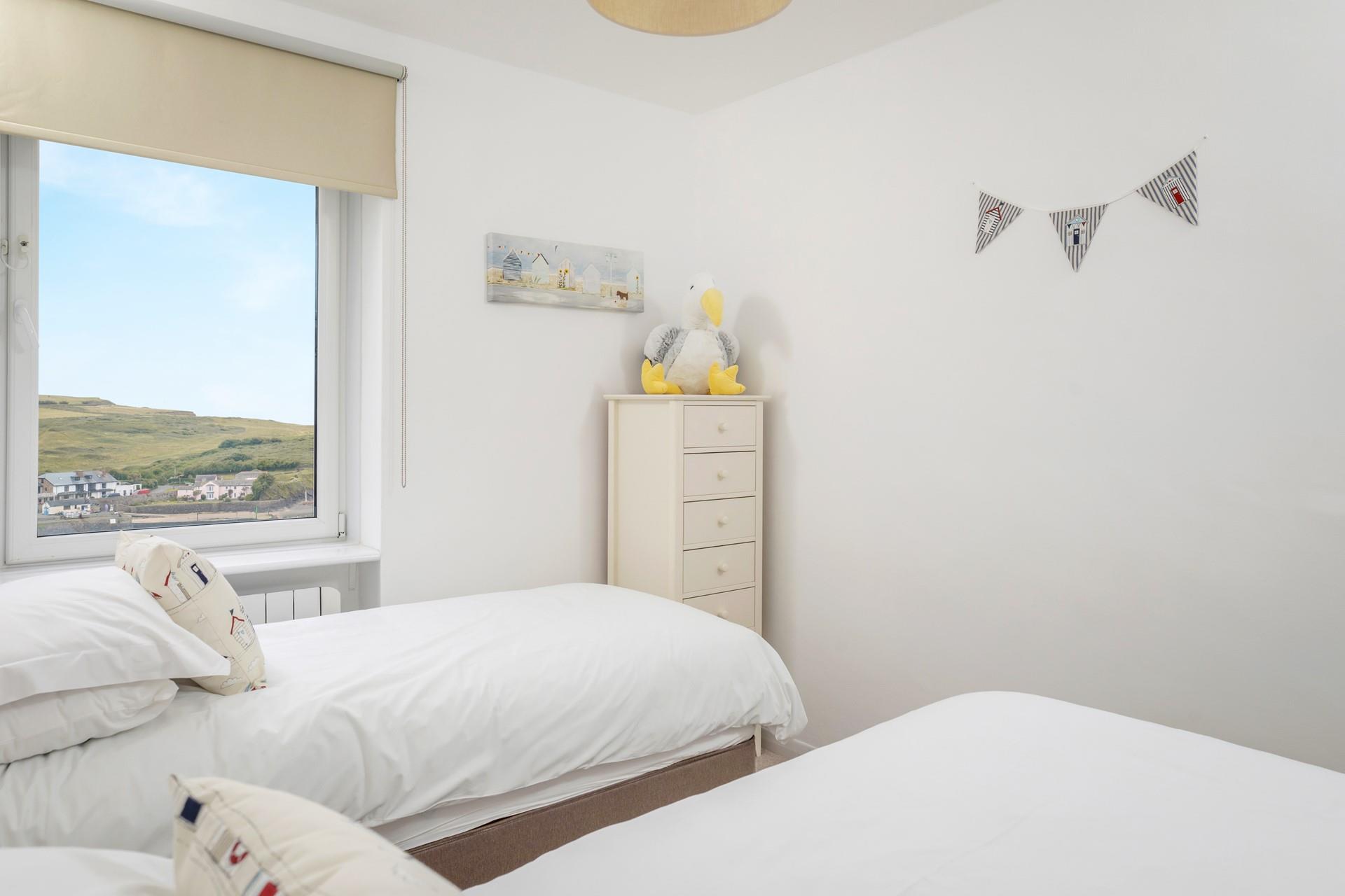 Settle the kids into bed after a fun-filled day at Bude Sea Pool.