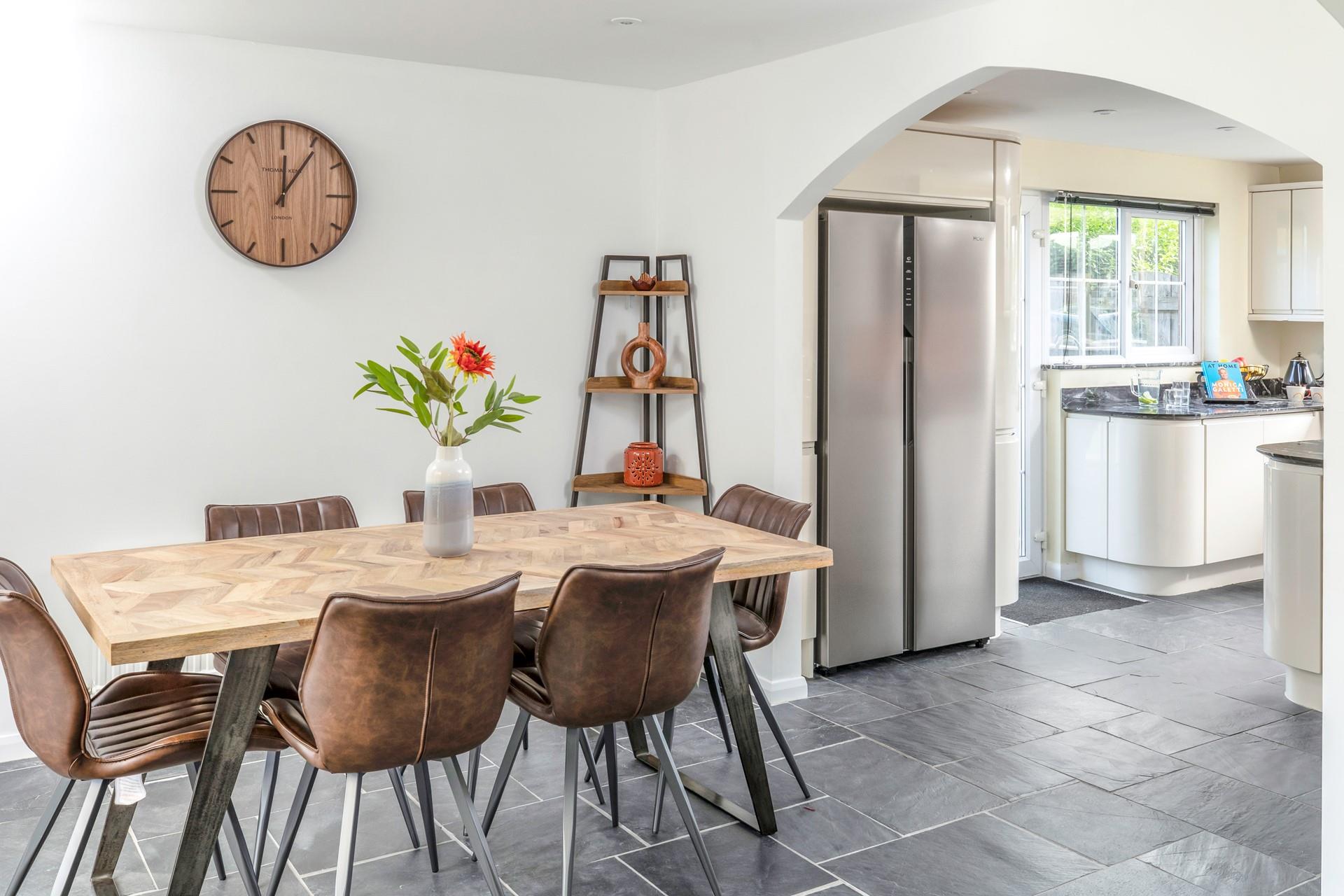 Sit around the table ready to tuck into a delicious home-cooked meal.