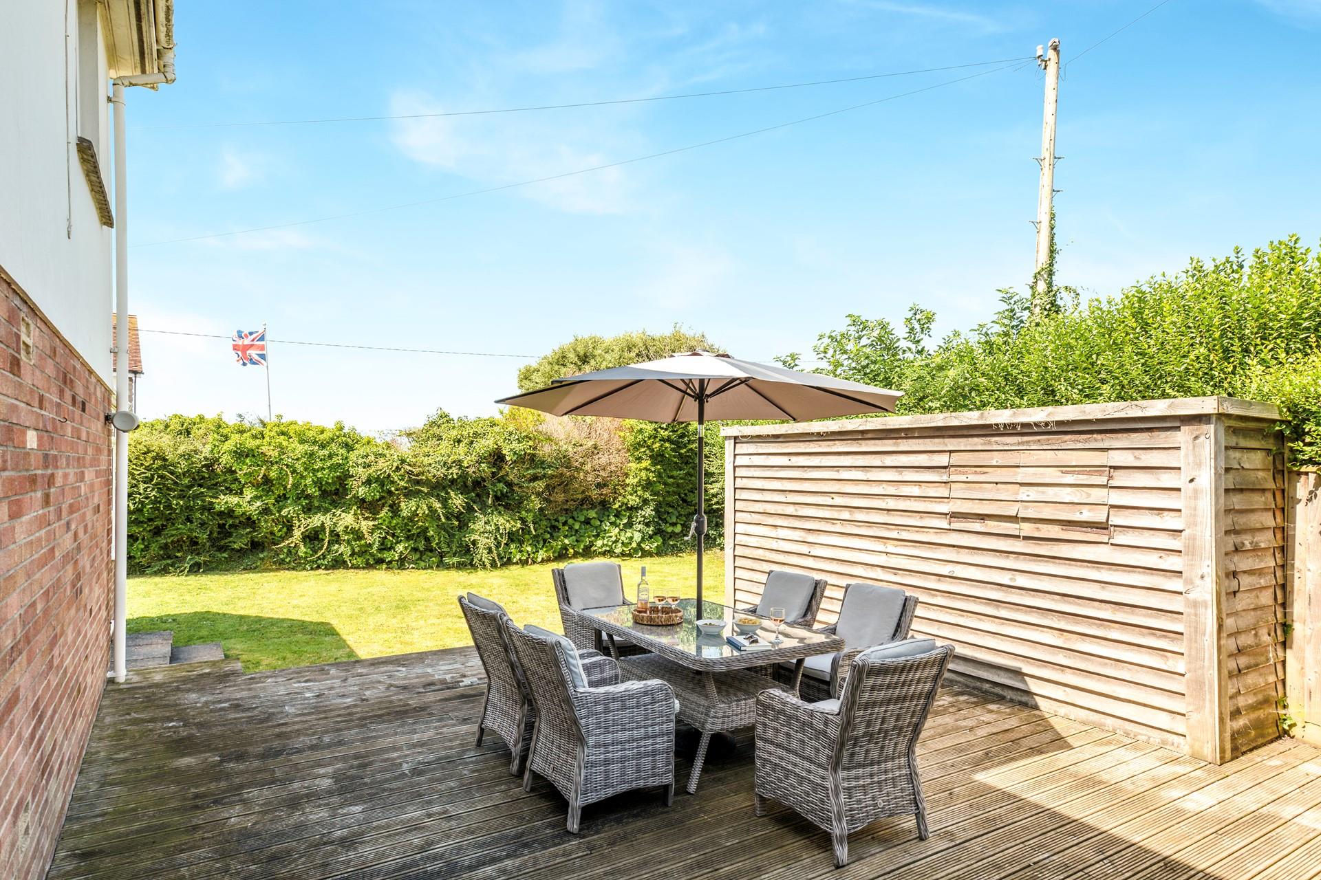 Step outside to the sunny garden for an alfresco drink.