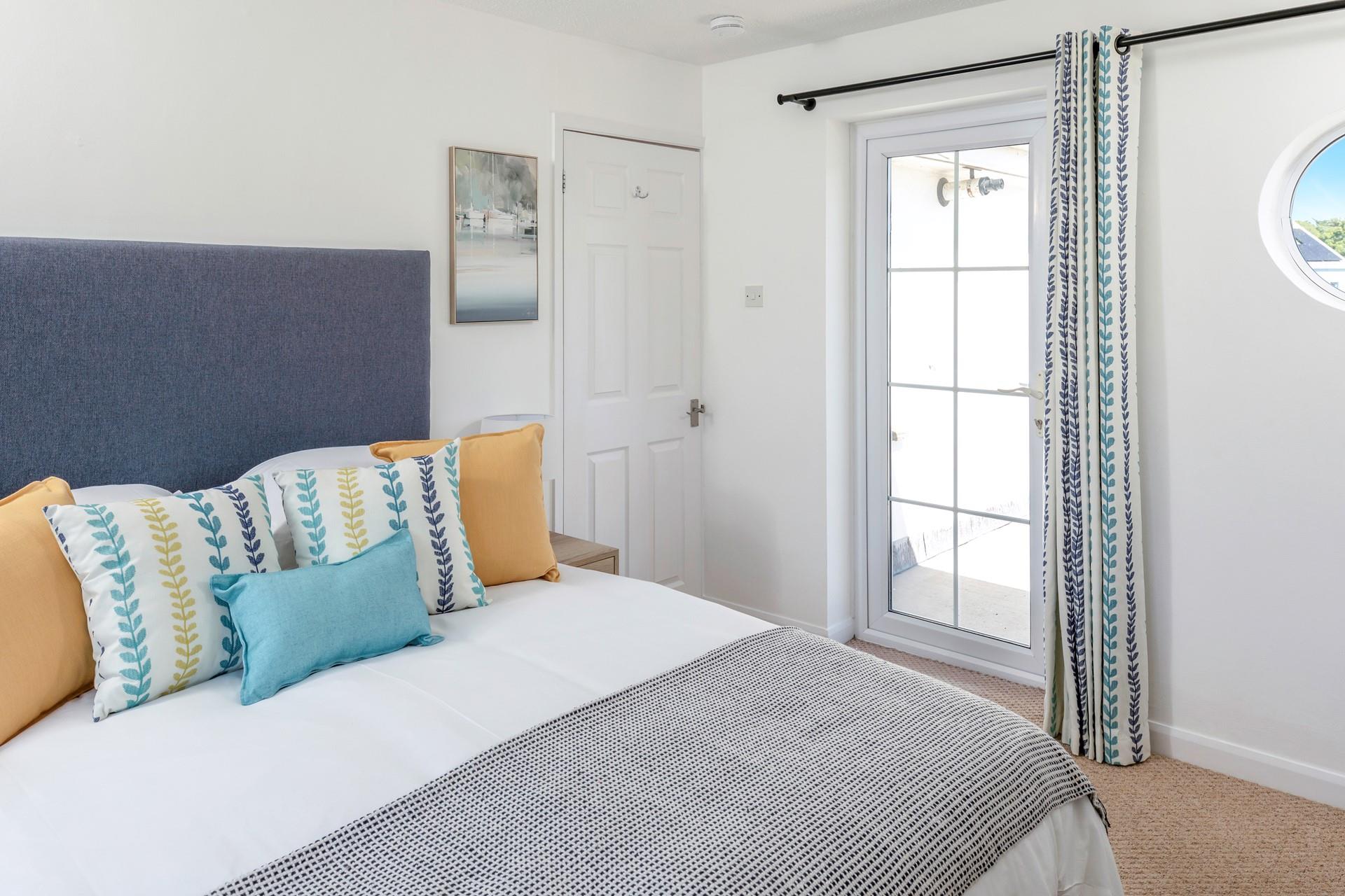 The king size bed is the perfect place to relax after a busy day of exploring.