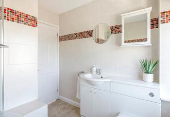 The family bathroom is ideal for getting ready each morning.