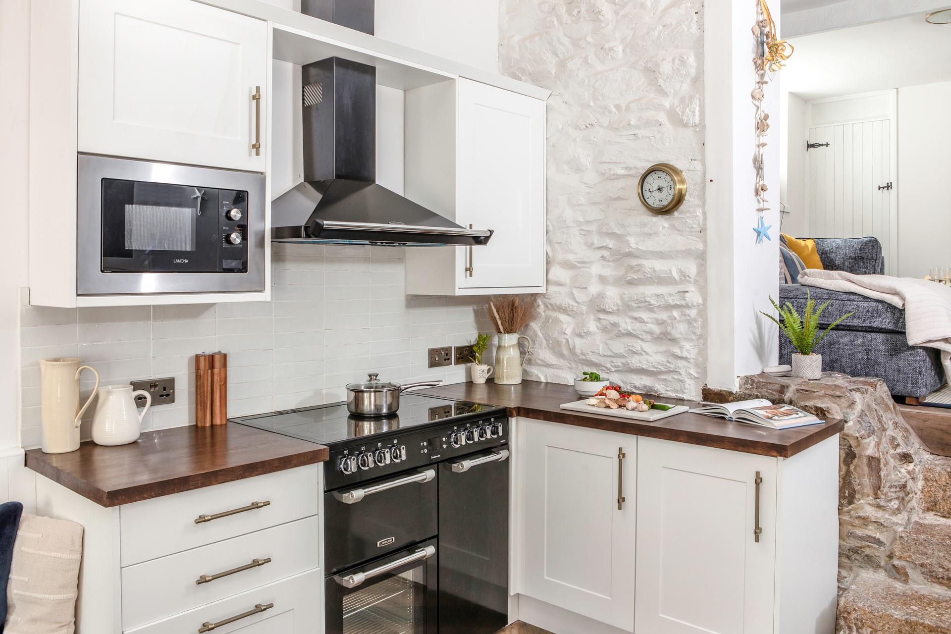 The kitchen is well-equipped for cooking tasty meals.