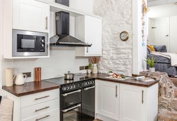 The kitchen is well-equipped for cooking tasty meals.