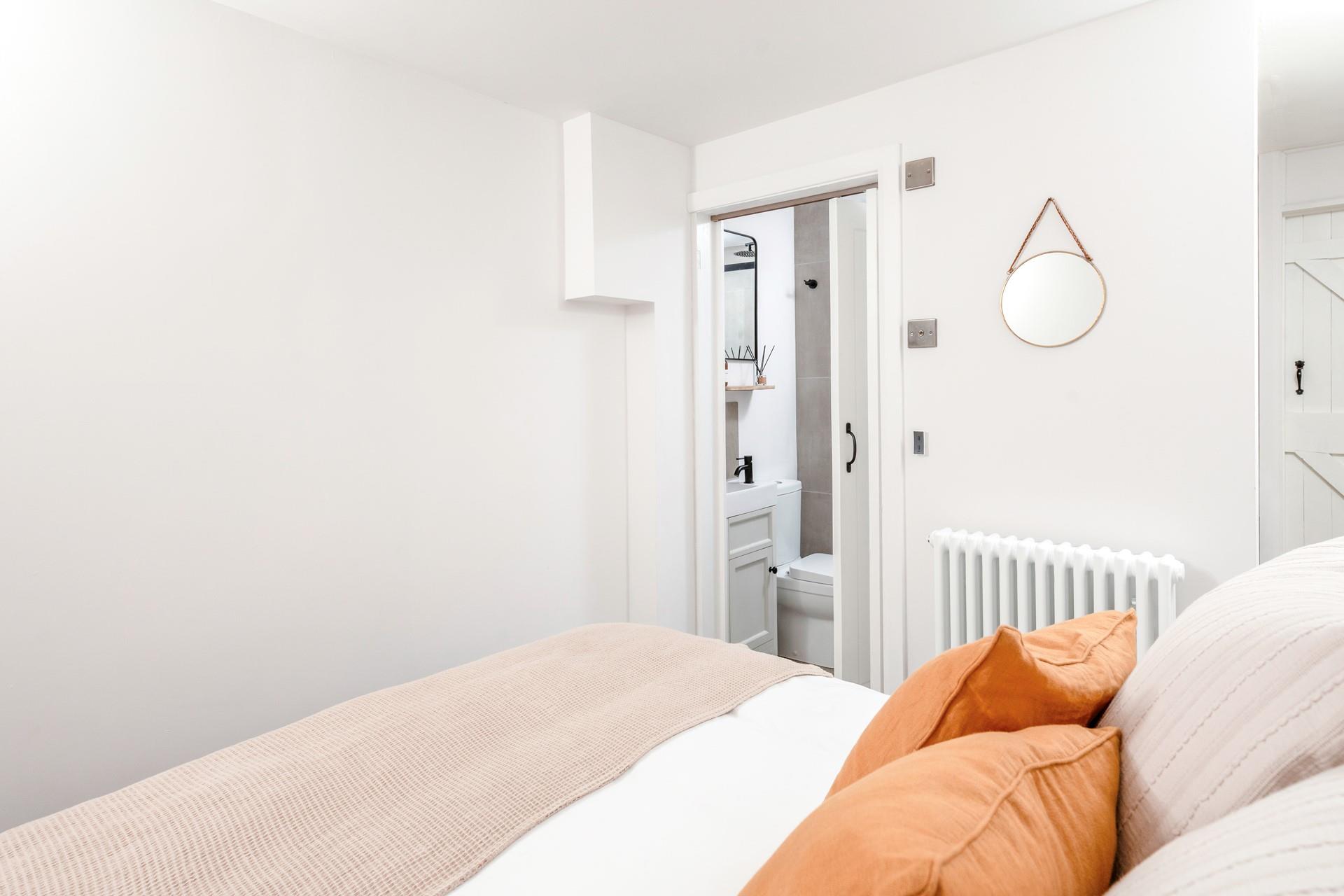 Bedroom 1 has an en suite shower room.