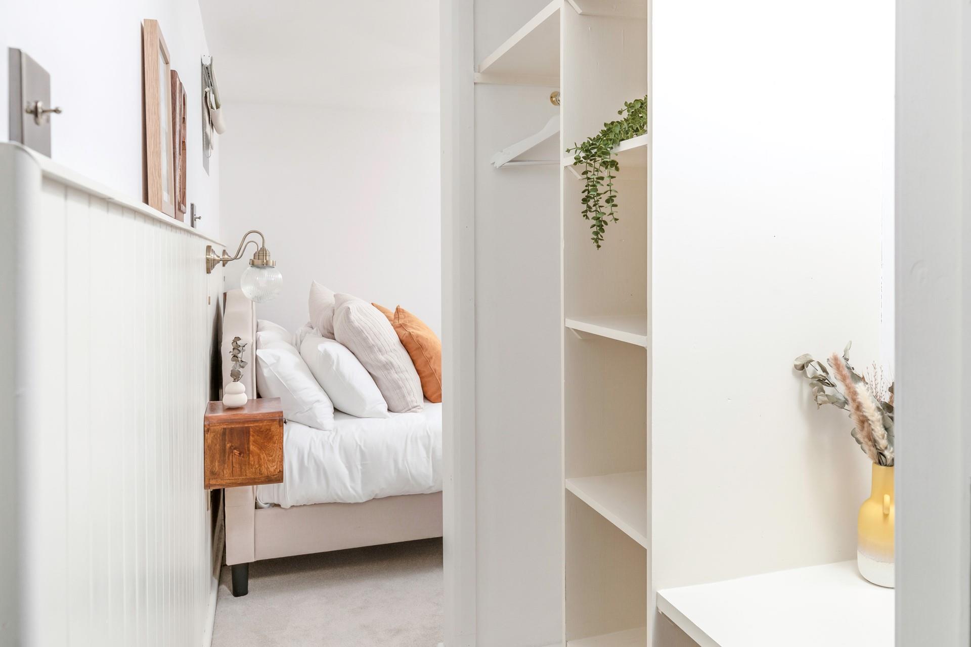 Bedroom 1 is a relaxing space to return to.