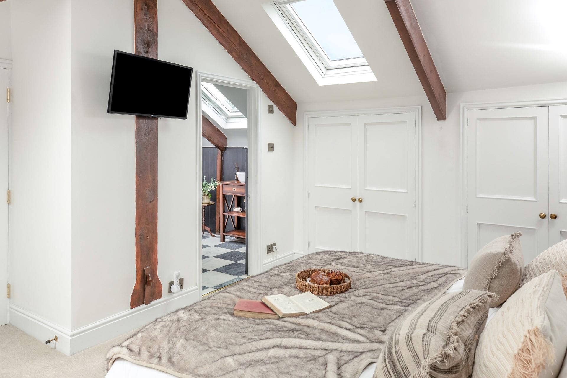 The en suite bathroom is the ideal space to get ready each morning.