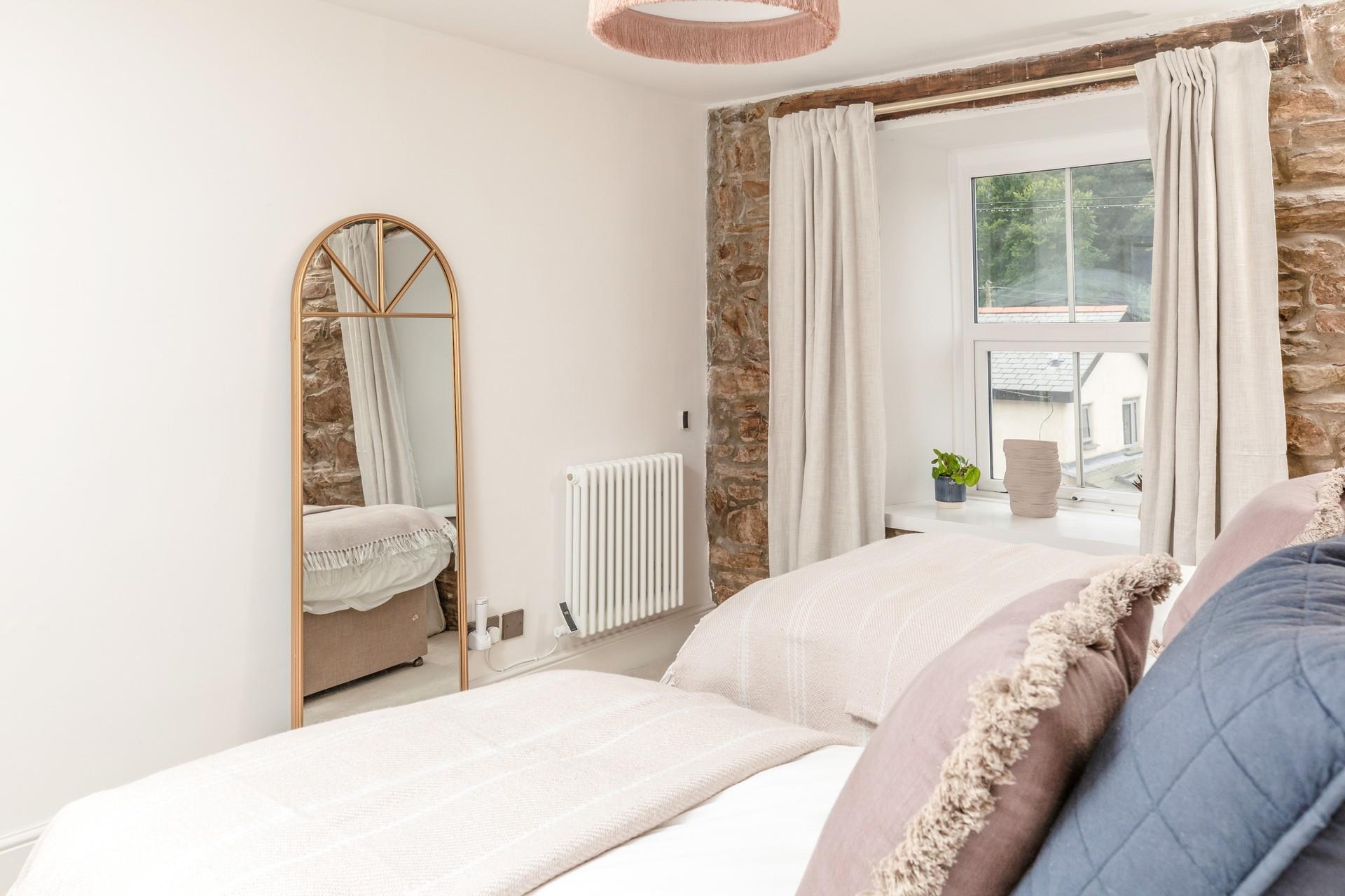 We love the stylish mirror in bedroom 2 for getting ready each day.